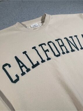 Reflex Beige Crewneck Sweater with Dark Green 'CALIFORNIA' Lettering